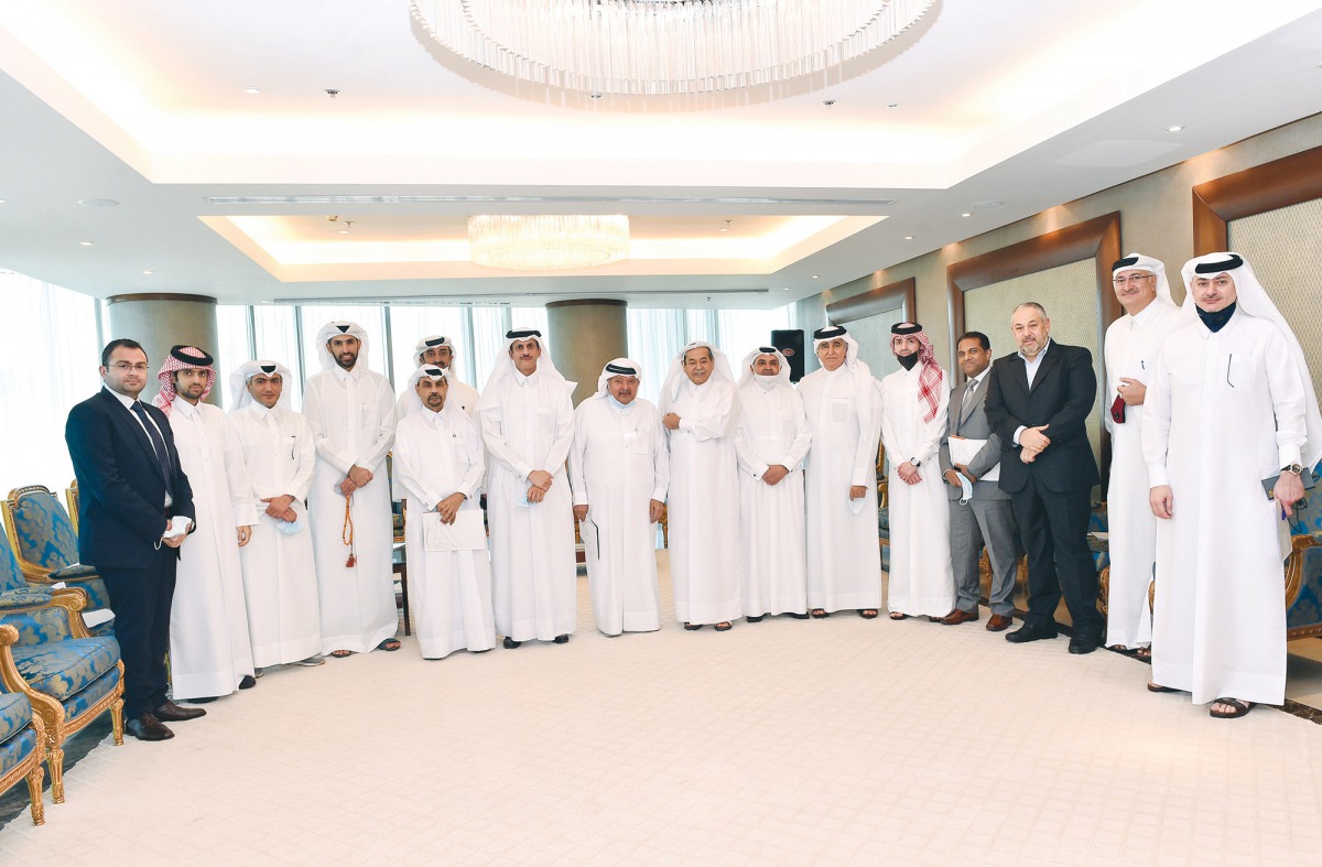 Chairman of the Qatari Businessmen Association, Sheikh Faisal bin Qassim Al Thani; Second-Deputy Sheikh Dr. Khalid bin Thani Al Thani and other members of the association posing for a group photo.