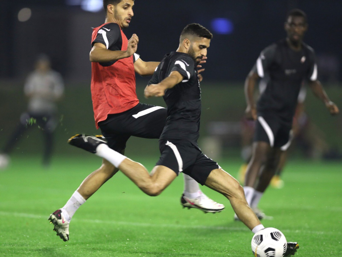 Qatar players in action during a training session.