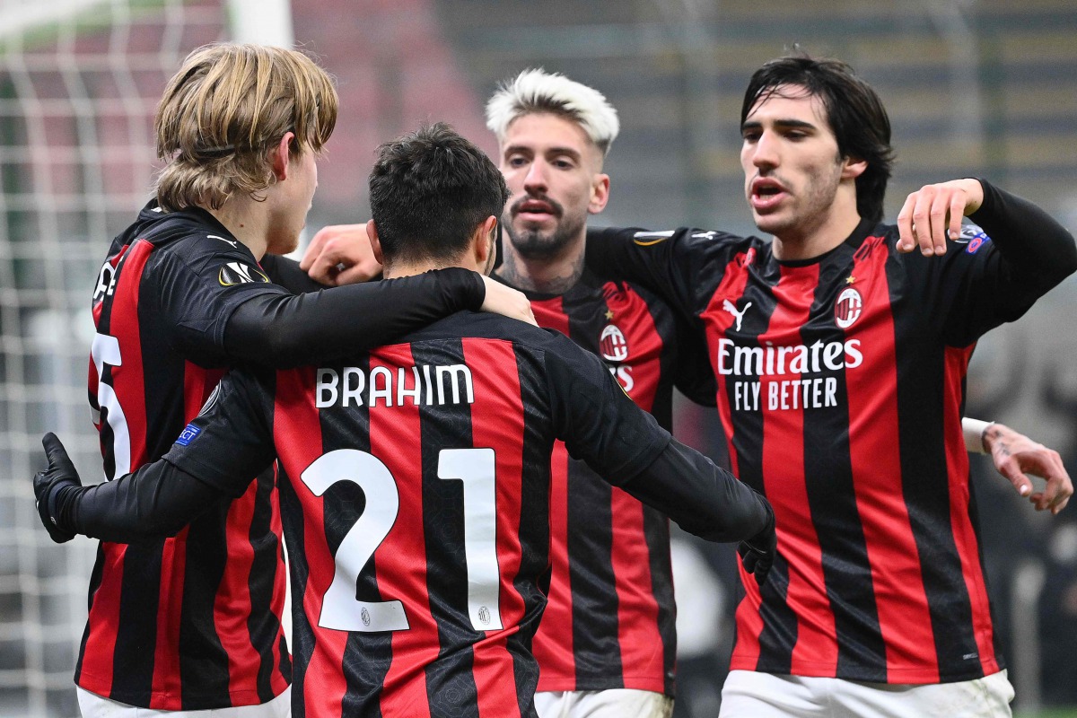 AC Milan's Spanish midfielder Brahim Diaz (2ndL) celebrates with (From L) AC Milan's Norwegian forward Jens Petter Hauge, AC Milan's Spanish forward Samuel Castillejo and AC Milan's Italian midfielder Sandro Tonali after scoring during the UEFA Europa Lea