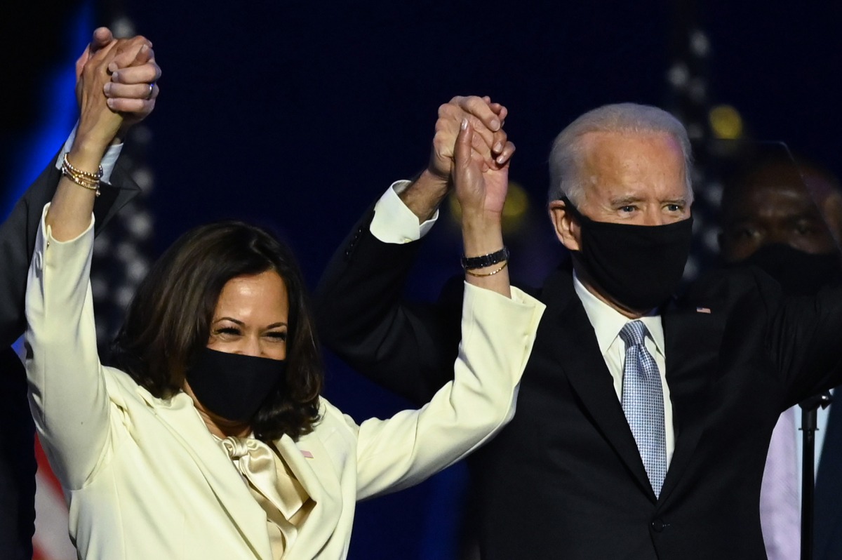 (FILES) In this file photo taken on November 7, 2020 US President-elect Joe Biden and Vice President-elect Kamala Harris stand onstage after delivering remarks in Wilmington, Delaware, after being declared the winners of the presidential election. AFP / J