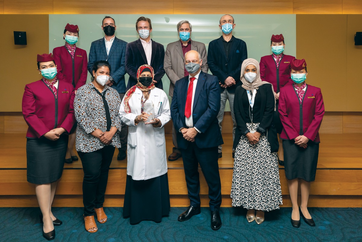 Qatar Airways’ medical team with HMC's healthcare professionals  during the appreciation event yesterday.  