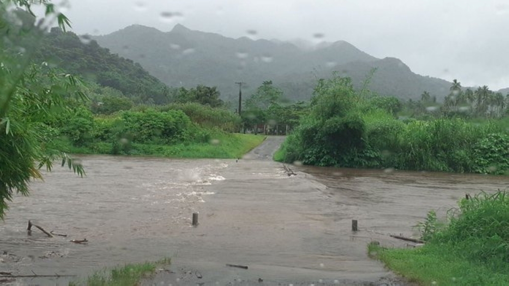 The Bagata Crossing is seen flooded on Vunivesi Road in Savusavu, as Cyclone Yasa passes through Fiji, December 17, 2020, in this photo obtained from social media. Fiji Roads Authority/via REUTERS 