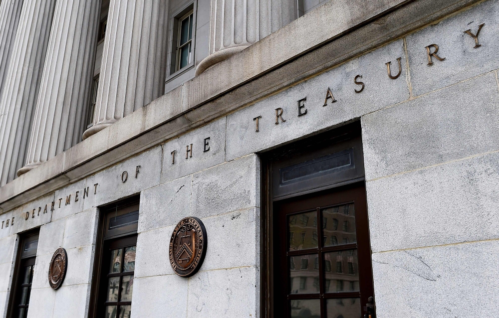 (FILES) In this file photo an exterior view of the building of US Department of the Treasury is seen on March 27, 2020 in Washington, DC. AFP / Olivier Douliery 