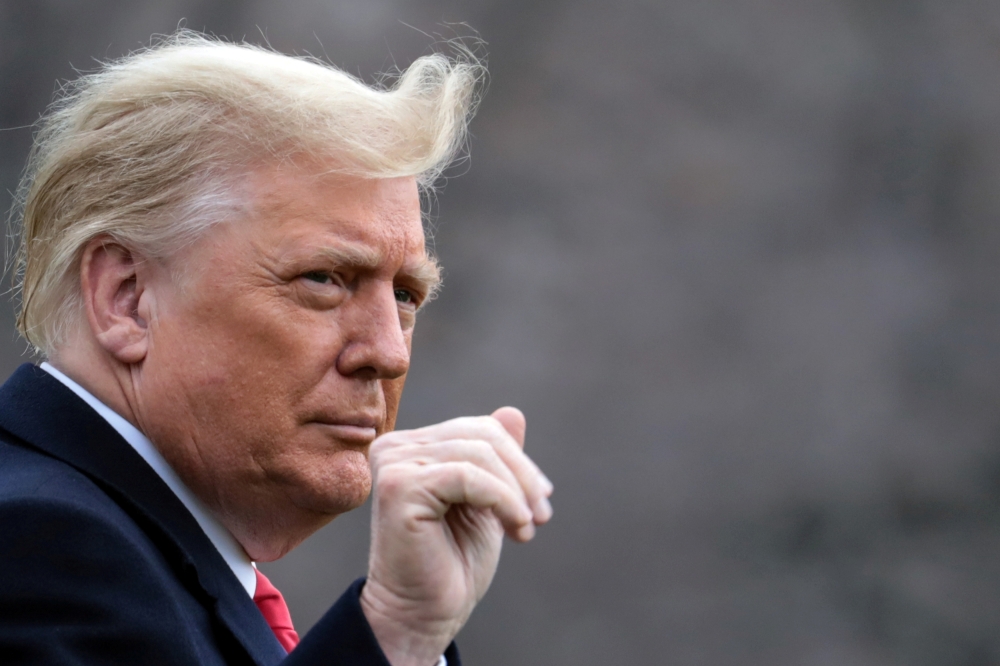 FILE PHOTO: U.S. President Donald Trump departs on travel to West Point, New York from the South Lawn at the White House in Washington, U.S., December 12, 2020. REUTERS/Cheriss May