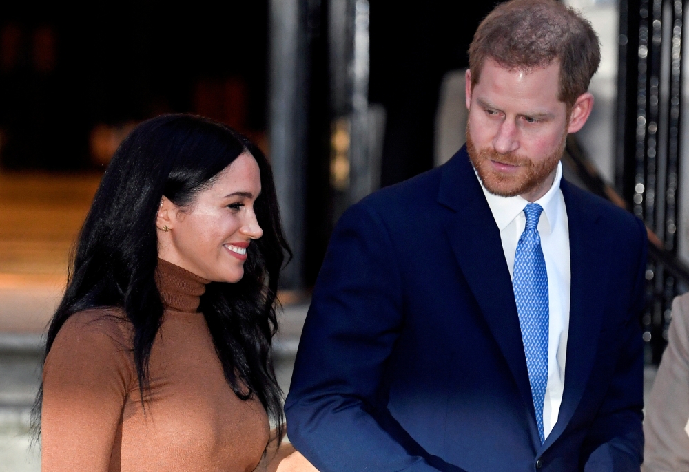 Britain's Prince Harry and his wife Meghan, Duchess of Sussex, leave Canada House in London, Britain January 7, 2020. REUTERS/Toby Melville/File Photo