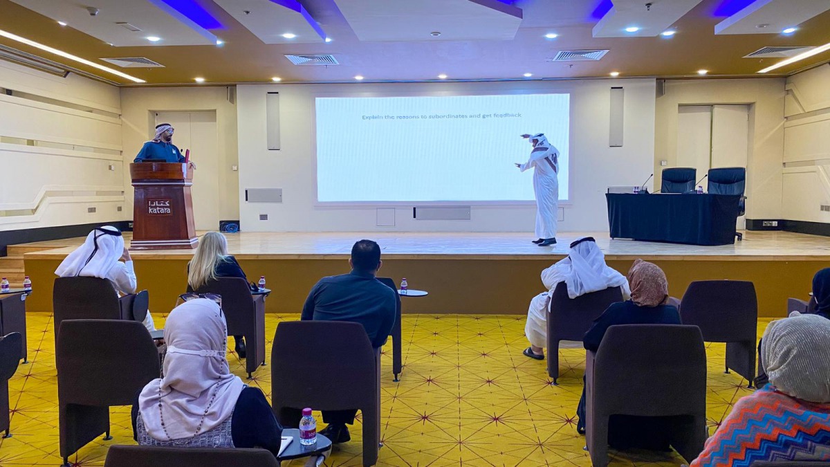 Eng. Ibrahim Al Sulaiti delivering a lecture on change management at Katara.