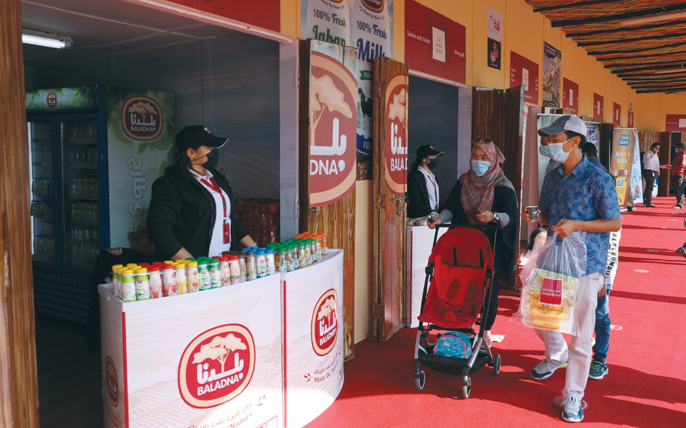 Visitors and representatives of local farm and food producers at the fifth Mahaseel Festival, at Katara, yesterday.   