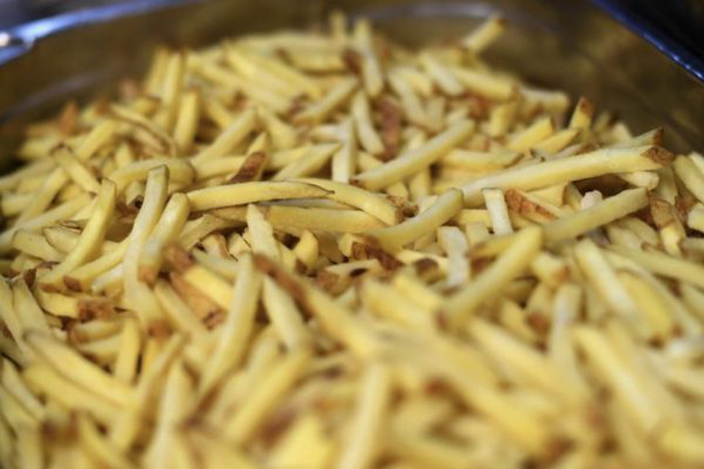 Chips are seen at Hawksmoor, Seven Dials on the opening day of 
