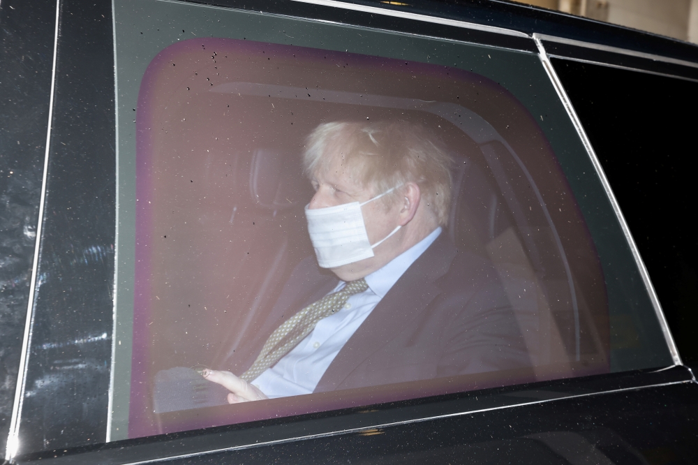 Britain's Prime Minister Boris Johnson wearing a face mask leaves BBC Broadcasting House, in London, Britain January 3, 2021. REUTERS/Simon Dawson