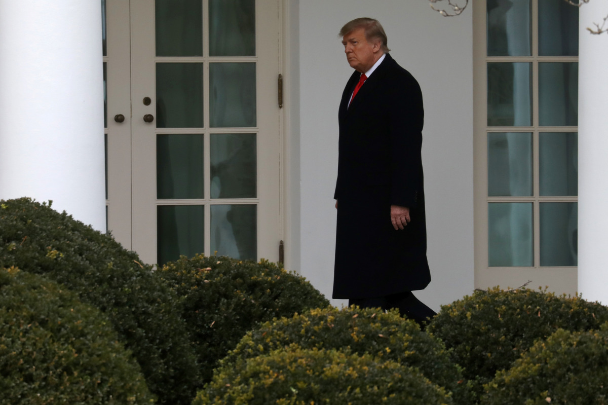 U.S. President Donald Trump walks to the Oval Office after returning from Mar-A-Lago to the White House in Washington, U.S., December 31, 2020. REUTERS/Leah Millis
