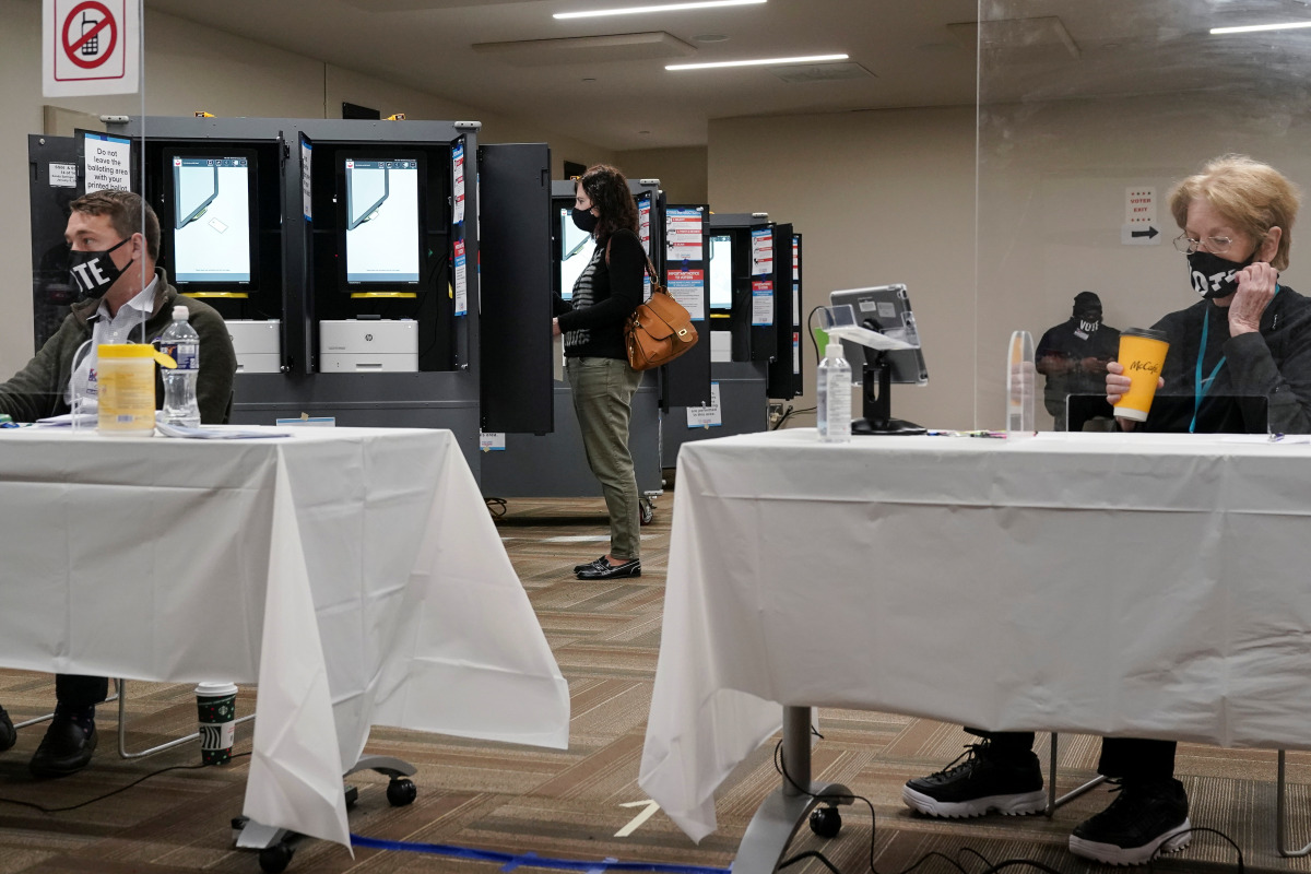 makes history with runoffs deciding Senate, Biden agenda The