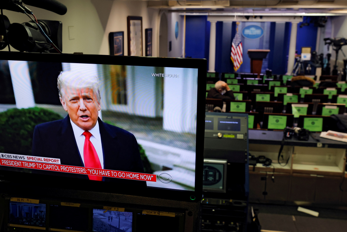 U.S. President donald trump is seen making remarks on a television monitor from the White House Briefing Room, after his supporters interrupted the certification by the U.S. Congress of the results of the 2020 U.S. presidential election at the Washington 