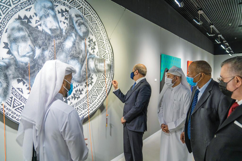 Katara General Manager Prof. Dr. Khalid bin Ibrahim Al Sulaiti (centre) along with ambassadors and guests at the opening of “21” exhibition at Katara yesterday.