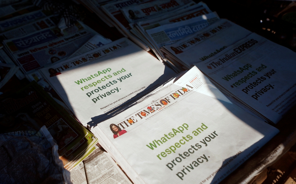 A WhatsApp advertisement is seen on the front pages of newspapers at a stall in Mumbai, India, January 13, 2021. Picture taken January 13, 2021. REUTERS/Francis Mascarenhas
