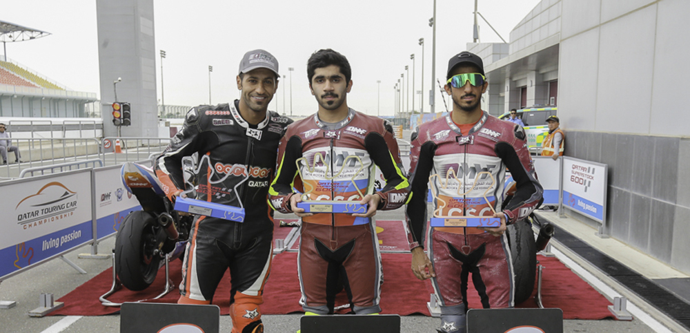 Abdulla Al Qubaisi (centre), Saeed Al Sulaiti (left) and Mashel Al Naimi pose with their trophies at the end of the 2019-20 season.