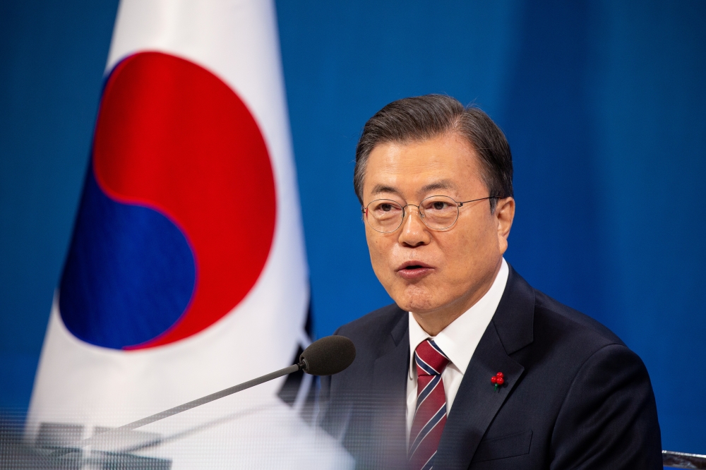 South Korean President Moon Jae-in speaks during an online New Year news conference with local and foreign journalists at the Presidential Blue House in Seoul, South Korea, January 18, 2021. Jeon Heon-Kyun/Pool via REUTERS