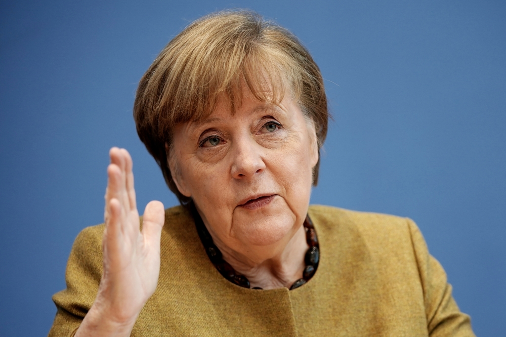 German Chancellor Angela Merkel addresses a news conference at the Bundespressekonferenz, about the current situation of the spread of the coronavirus disease (COVID-19), in Berlin, Germany, January 21, 2021. Michael Kappeler/Pool via REUTERS