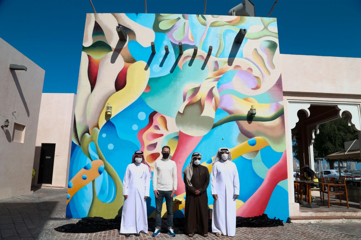 Katara General Manager Prof Dr. Khalid bin Ibrahim Al Sulaiti (second right) at the unveiling of the murals of works by prominent Qatari artist Dr. Wafa Al Hamad at Katara Building 36, yesterday.