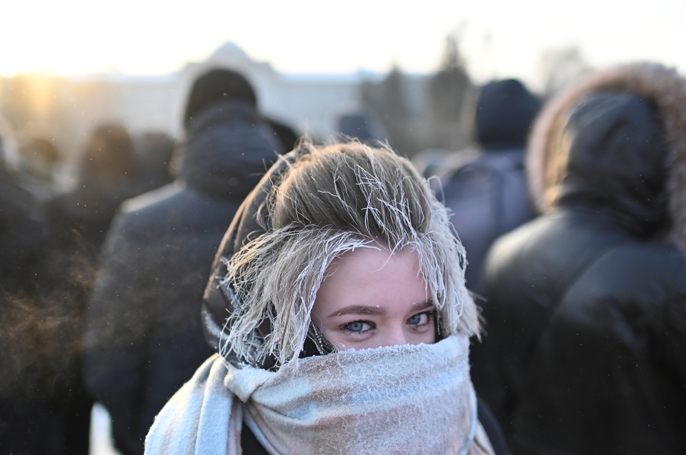A woman attends a rally in support of jailed Russian opposition leader Alexei Navalny in Omsk, Russia January 23, 2021. REUTERS/Alexey Malgavko