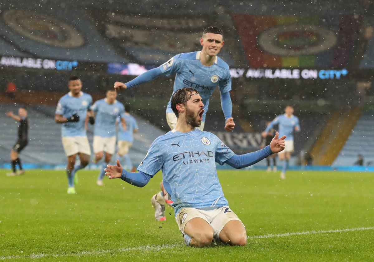 Soccer Football - Premier League - Manchester City v Aston Villa - Etihad Stadium, Manchester, Britain - January 20, 2021 Manchester City's Bernardo Silva celebrates scoring their first goal Pool via REUTERS/Martin Rickett 