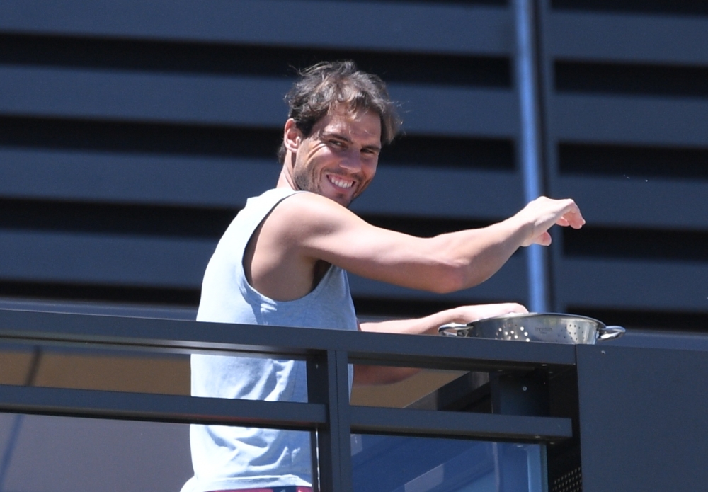 Tennis players undergo quarantine ahead of Australian Open - Adelaide, Australia - January 23, 2021 Rafael Nadal is seen smiling from his balcony at the M Suites accommodation in North Adelaide, where tennis players are undergoing mandatory quarantine ahe