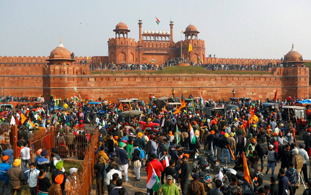 FILE PHOTO: Farmers gather in front of the historic Red Fort during a protest against farm laws introduced by the government, in Delhi, India, January 26, 2021. REUTERS/Adnan Abidi/File Photo
