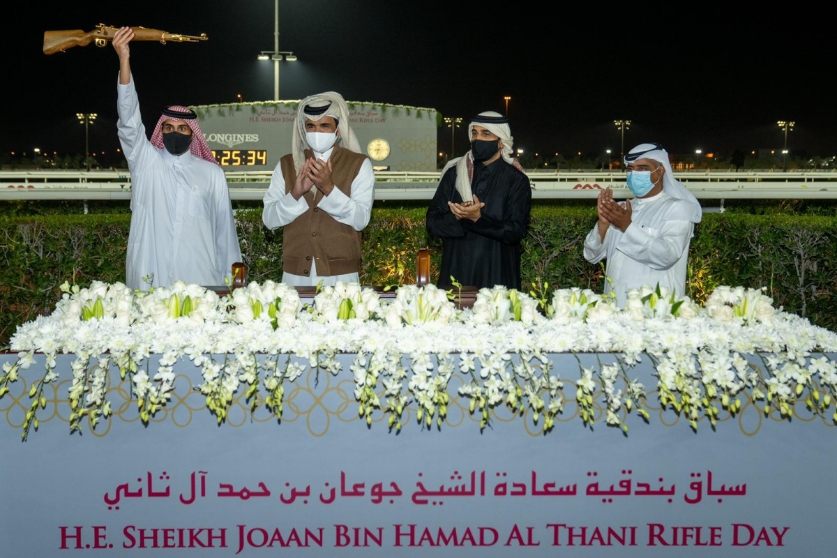 Qatar Olympic Committee President, H E Sheikh Joaan bin Hamad Al Thani gestures after presenting His Excellency’s Rifle to Ali Bin Hamad Bin Ali Al Attiyah - representative of Al Wasmiyah Farm-owned Noor Al Hawa.