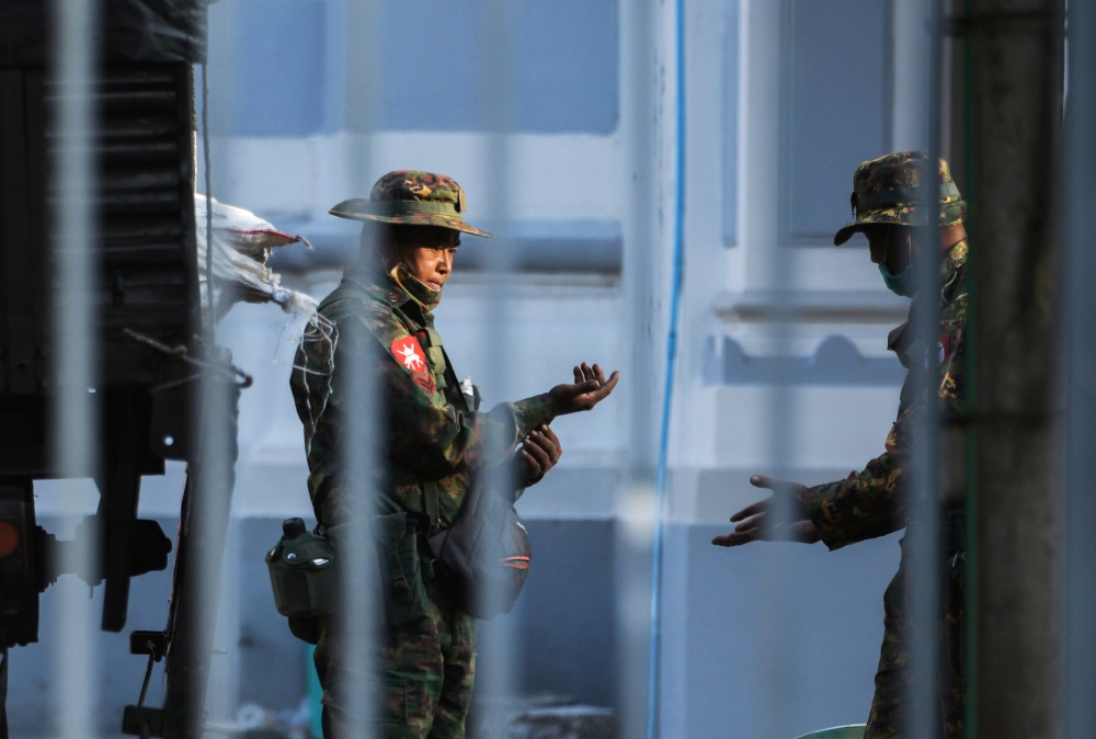 Myanmar soldiers are seen inside City Hall in Yangon, Myanmar February 1, 2021. REUTERS/Stringer