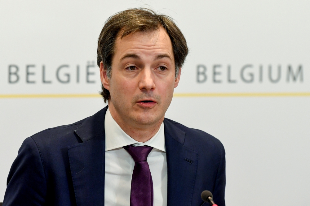 Belgium's Prime Minister Alexander De Croo holds a news conference after a government meeting on the coronavirus disease (COVID-19) as its spread continues, in Brussels, Belgium February 5, 2020. Frederic Sierakowski/Pool via REUTERS