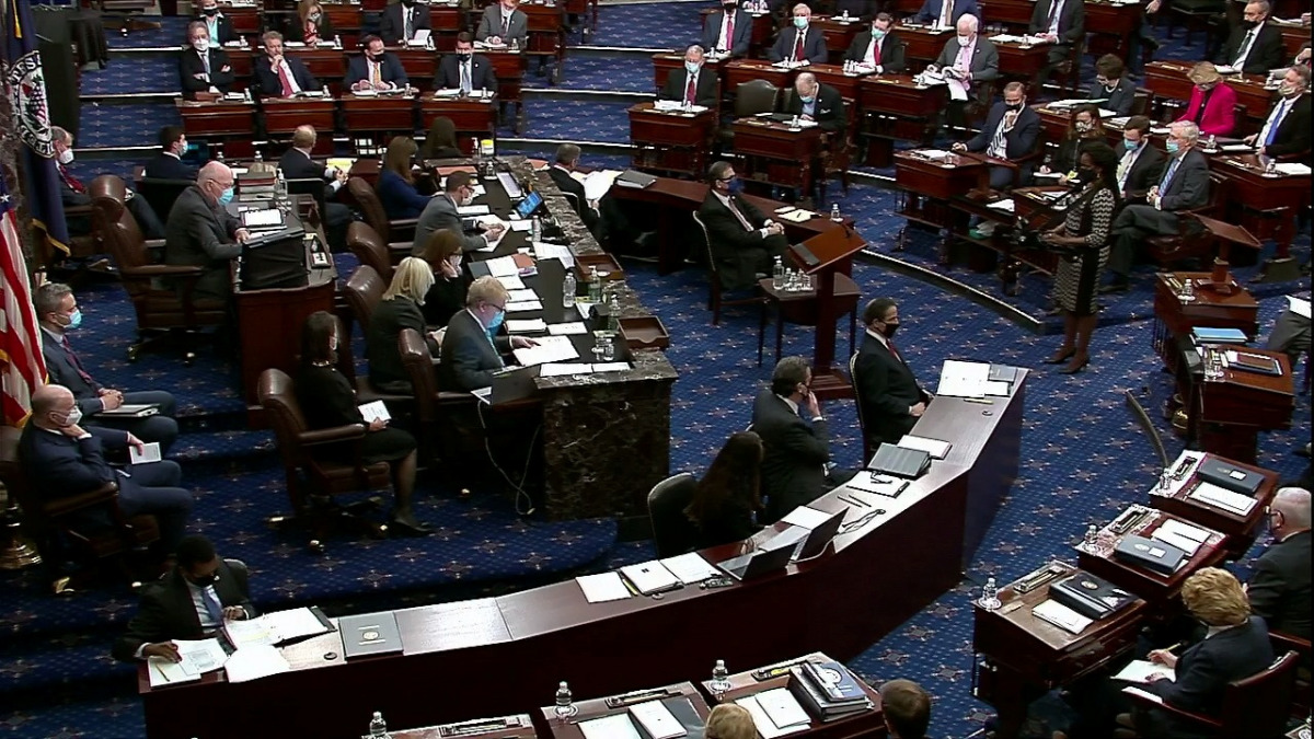 The U.S. Senate votes on the rules to govern the trial as it begins the second impeachment trial of former U.S. President Donald Trump, on charges of inciting the deadly attack on the U.S. Capitol, on the floor of the Senate chamber on Capitol Hill in Was