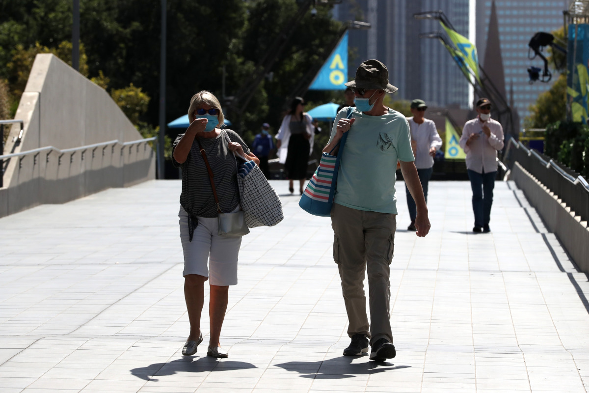 Fans are seen in Melbourne Park. It was announced the tournament will proceed without crowds over the next five days after the state of Victoria was placed under a snap lockdown from Friday to contain a fresh outbreak of the coronavirus disease (COVID-19)