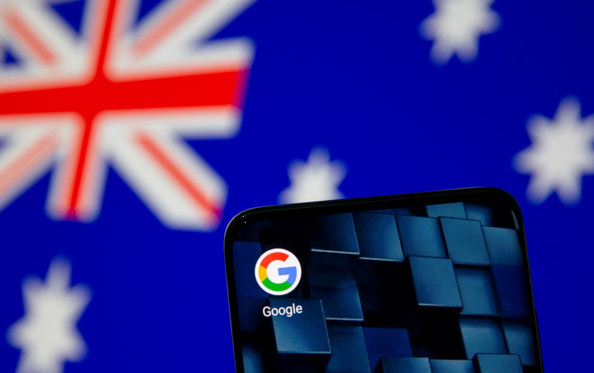 FILE PHOTO: Smartphone with Google app icon is seen in front of the displayed Australian flag in this illustration taken, Jan. 22, 2021. REUTERS/Dado Ruvic/Illustration/File Photo
