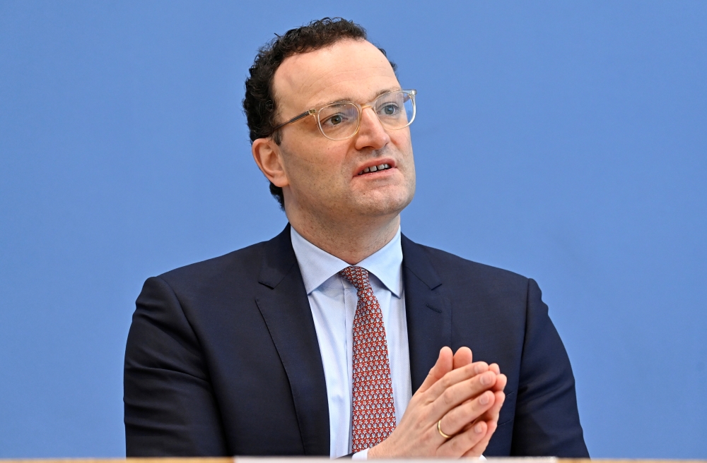 German Health Minister Jens Spahn gestures as he addresses a news conference, amid the coronavirus disease (COVID-19) pandemic, in Berlin, Germany, February 12, 2021. Tobias Schwarz/Pool via REUTERS