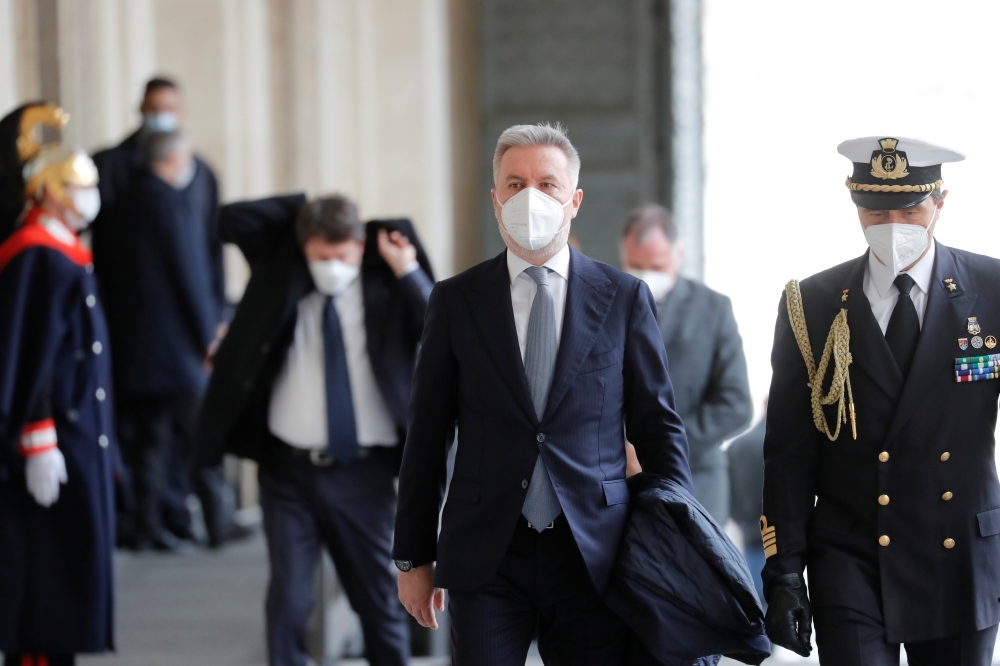 Italy's Defence Minister Lorenzo Guerini arrives at Quirinale Presidential Palace, before the sworn-in of Italy's new government, in Rome, Italy, February 13, 2021 REUTERS/Remo Casilli