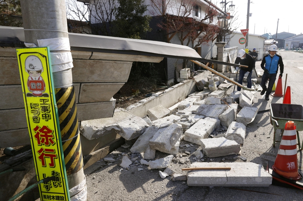 A collapsed wall by a strong earthquake is pictured in Kunimi, Fukushima Prefecture, Japan on February 14, 2021 in this photo taken by Kyodo. Kyodo/via Reuters