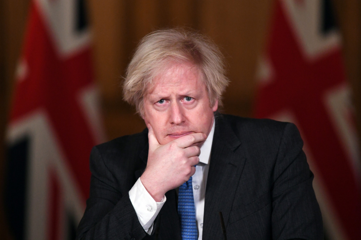 British Prime Minister Boris Johnson attends a coronavirus pandemic media briefing at Downing Street, London, Britain February 15, 2021. Stefan Rousseau/PA Wire/Pool via REUTERS
