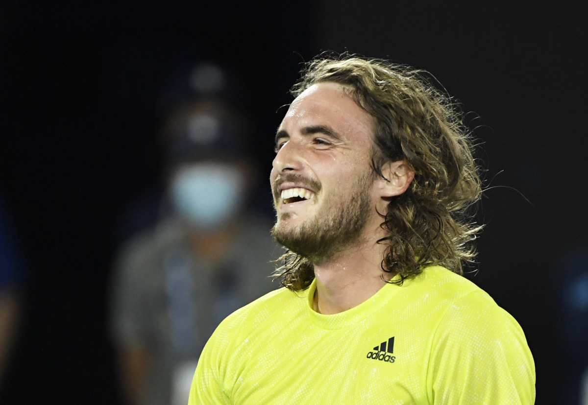 Tennis - Australian Open - Melbourne Park, Melbourne, Australia, February 17, 2021 Greece's Stefanos Tsitsipas celebrates winning his quarter final match against Spain's Rafael Nadal REUTERS/Jaimi Joy
