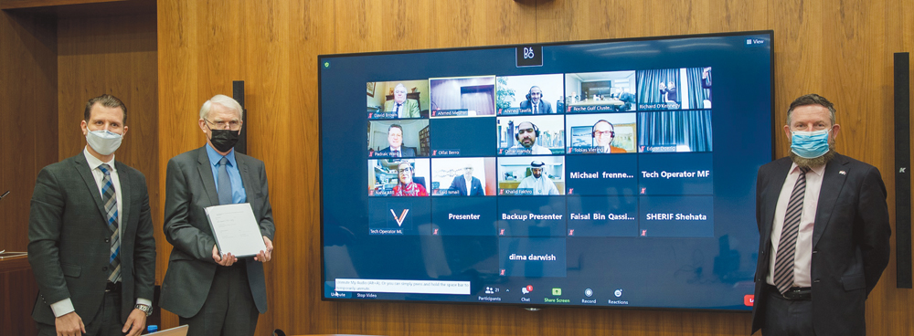 Representatives from QF and Roche during the announcement of partnership 