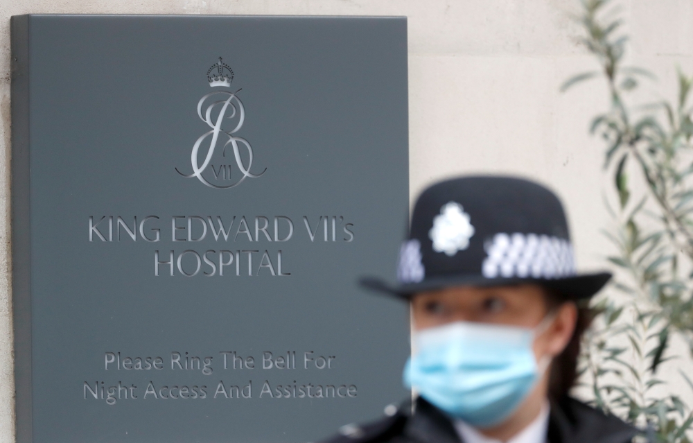A police officer stands outside King Edward VII's Hospital, where Britain's Prince Philip was admitted, in London, Britain, February 22, 2021. REUTERS/Matthew Childs