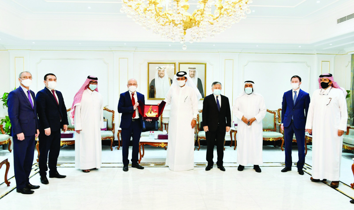 Qatar Chamber First Vice-Chairman, Mohamed bin Towar Al Kuwari, with Deputy Foreign Minister of Uzbekistan, H E Furqat Sidikov, and other officials, during their meeting in Doha yesterday.  
