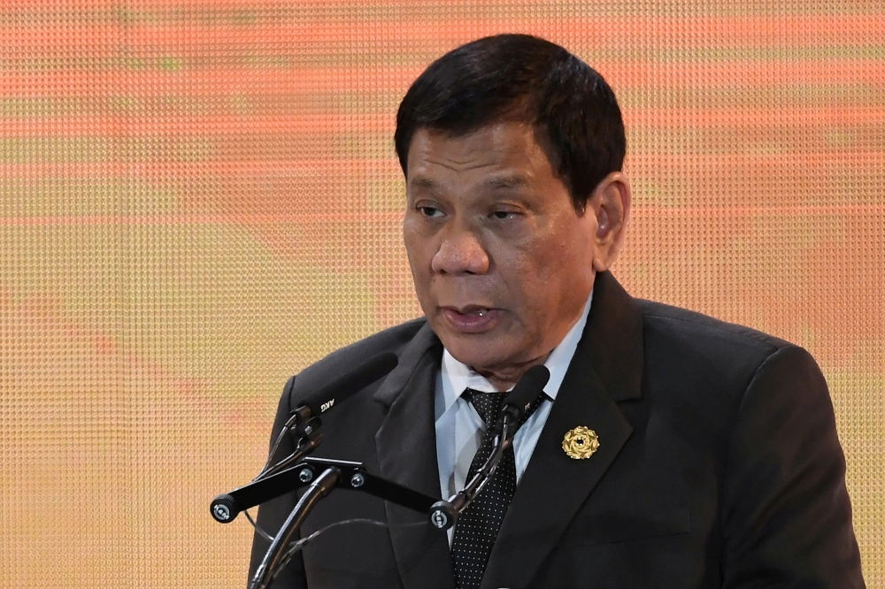 Philippine President Rodrigo Duterte speaks during the APEC CEO Summit, taking place ahead of the Asia-Pacific Economic Cooperation (APEC) leaders summit in the central Vietnamese city of Danang November 9, 2017. REUTERS/Hoang Dinh Nam/Pool/File Photo