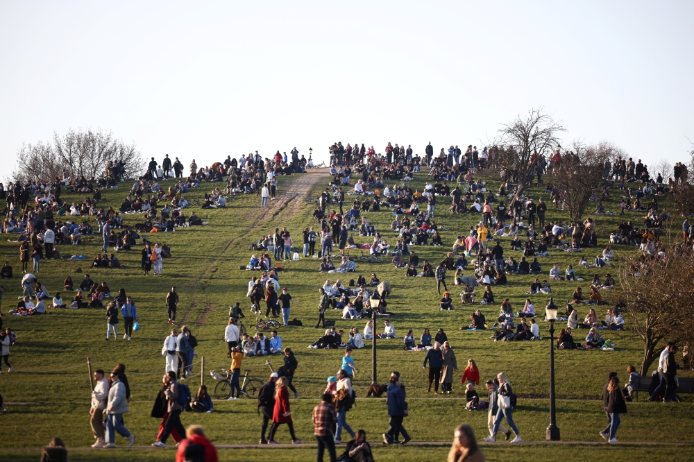 People visit Primrose Hill, amid the coronavirus disease (COVID-19) outbreak, in London, Britain, February 27, 2021. REUTERS/Henry Nicholls