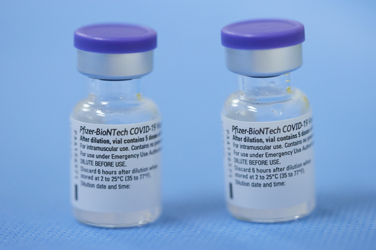 FILE PHOTO: FILE PHOTO: Vials of the Pfizer-BioNTech vaccine are pictured in a vaccination centre in Geneva, Switzerland, February 3, 2021. REUTERS/Denis Balibouse/File Photo/File Photo
