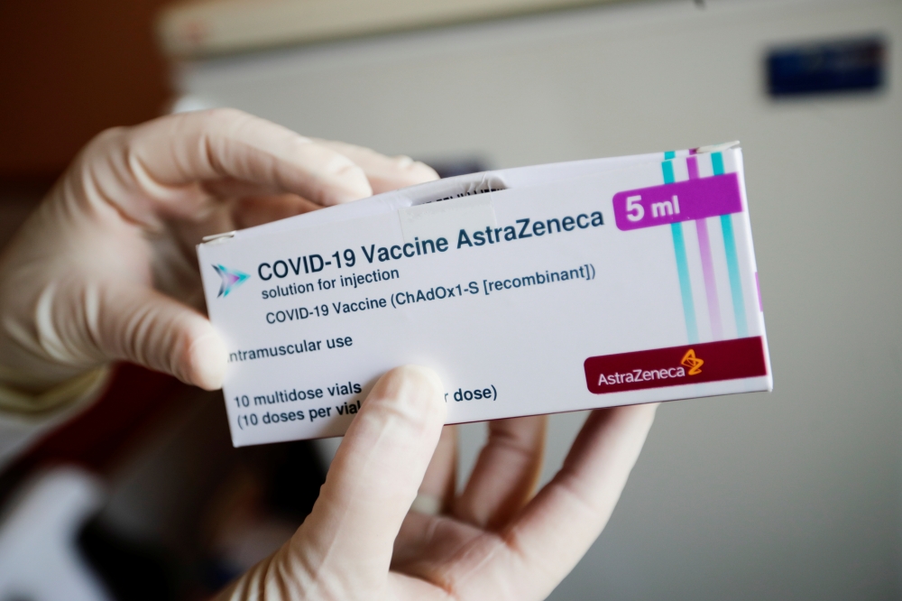 A package of the AstraZeneca COVID-19 vaccine is shown in the state of Brandenburg where the first coronavirus vaccinations are given in doctors' surgeries, in Senftenberg, Germany, March 3, 2021. REUTERS/Hannibal Hanschke/Pool