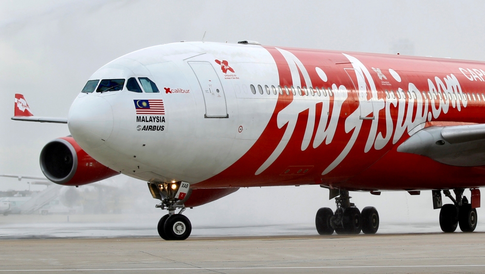 An AirAsia X Airbus A340 passenger jet arrives on its inaugural flight from Kuala Lumpur to Paris Orly Airport in Feb. 14, 2011. Reuters/Charles Platiau/File Photo