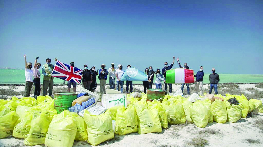 Officials from the embassies of the UK and Italy as well as the Unesco Office for the GCC Countries and Yemen, and the Doha Environmental Actions Project at a beach cleanup event at the Unesco World Heritage Site of Al Zubarah, yesterday.