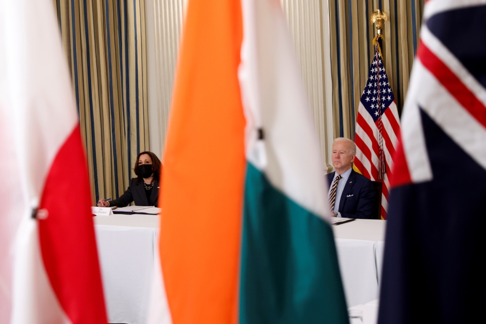 US President Joe Biden and Vice President Kamala Harris participate in a virtual meeting with Asia-Pacific nation leaders at the White House in Washington, U.S., March 12, 2021. REUTERS/Tom Brenner