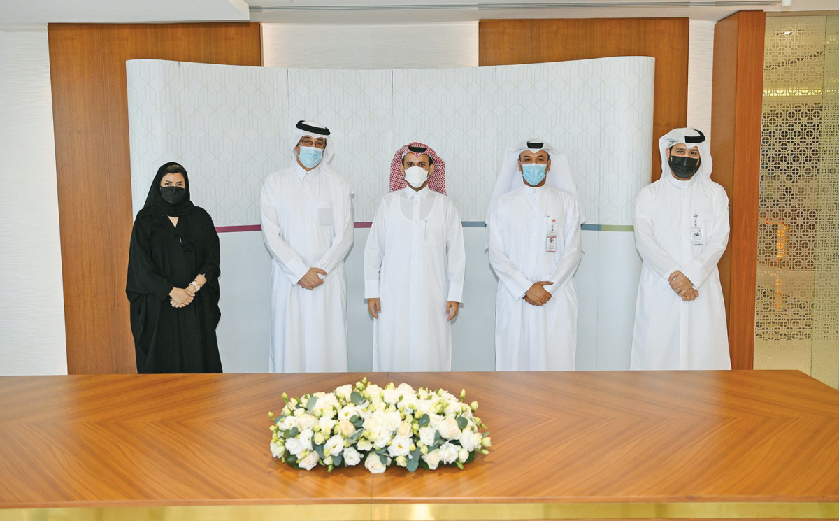 Officials of GTA, Commercial Bank of Qatar and QIIB during the agreement signing ceremony.