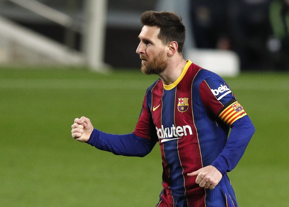 Barcelona's Lionel Messi celebrates scoring their fourth goal REUTERS/Albert Gea