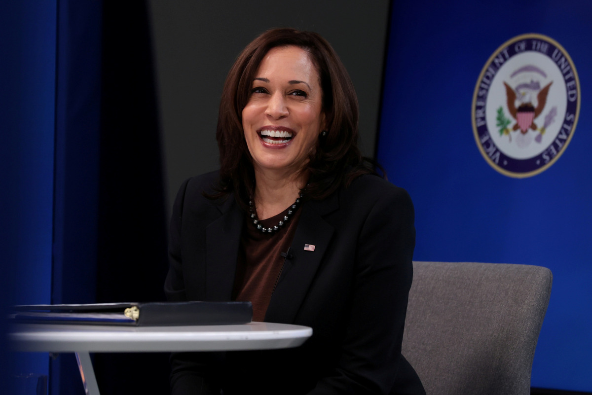 FILE PHOTO: U.S. Vice President Kamala Harris? smiles after delivering a keynote address to the House Democratic Caucus virtually on camera from the Eisenhower Executive Office Building at the White House in Washington, U.S. March 2, 2021. REUTERS/Jonatha
